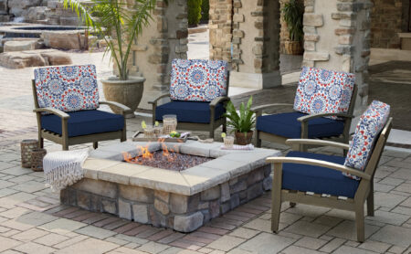 Blue and red deep seat outdoor cushions around firepit