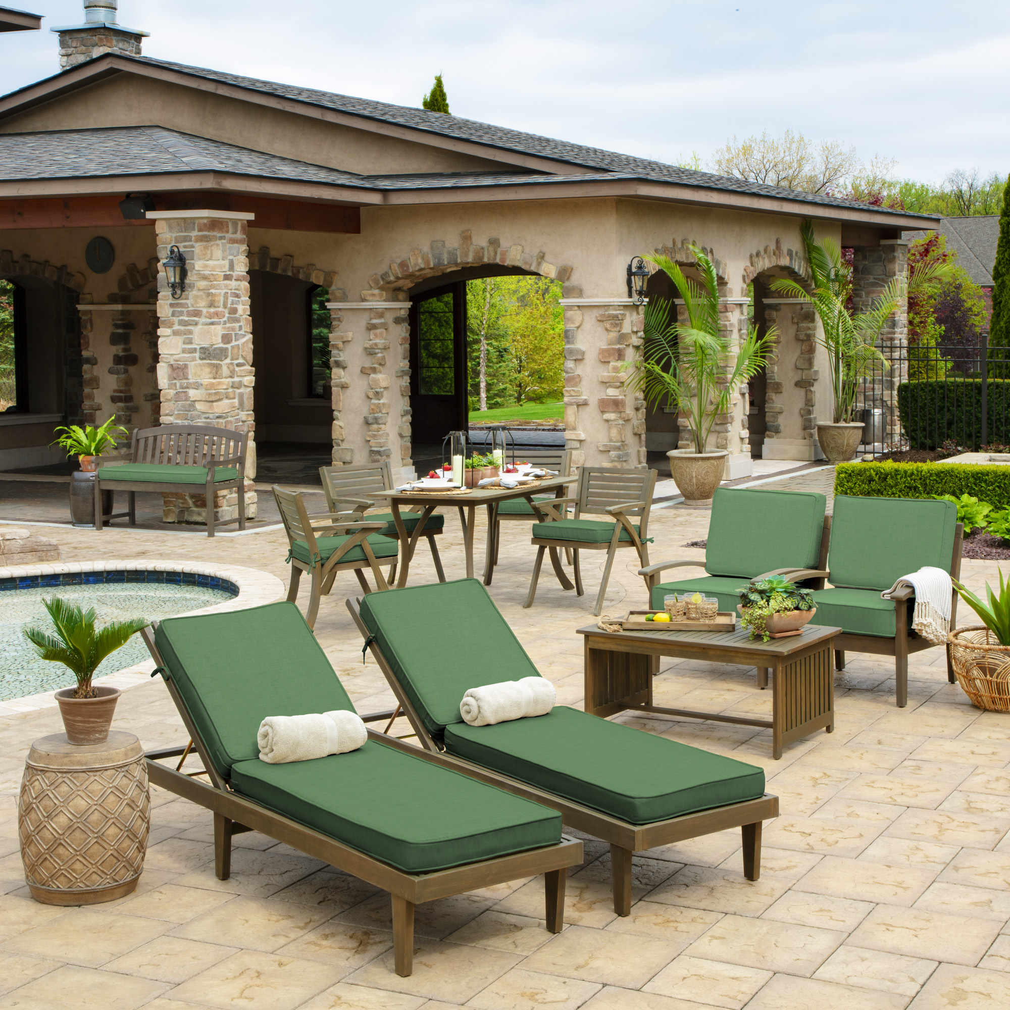 green outdoor cushions on patio